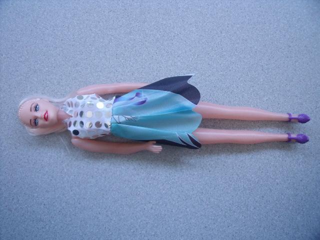 Plastic doll with accessories