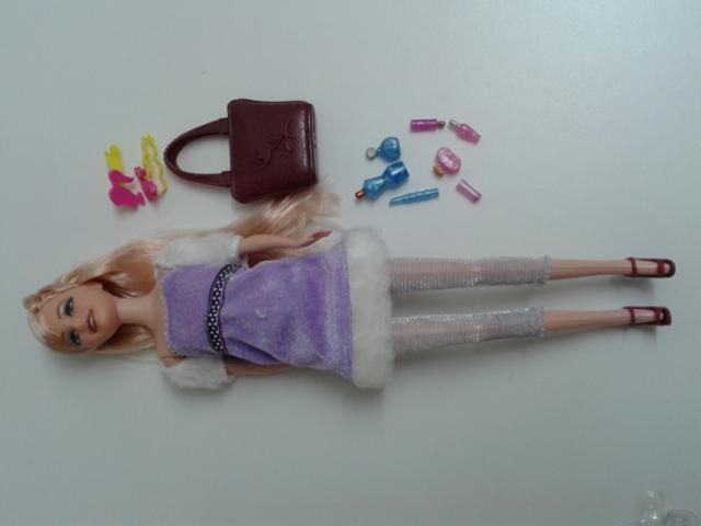 Plastic doll with accessories