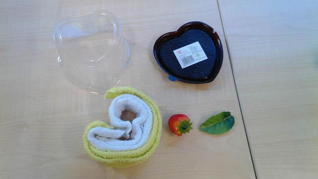 Towel with decorative strawberry