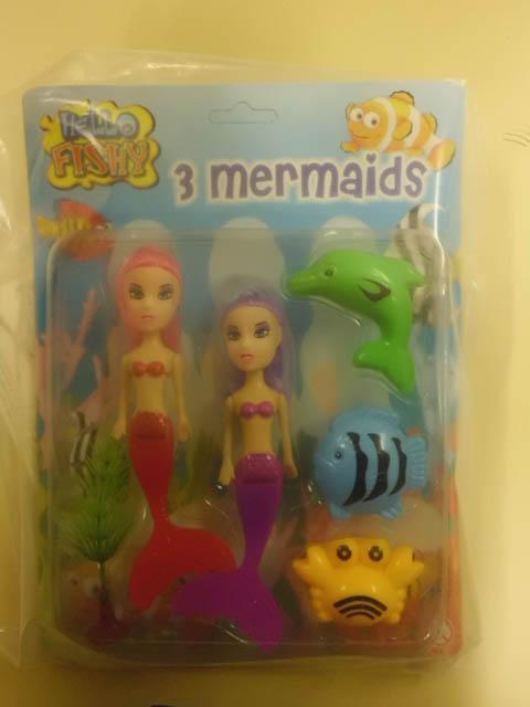 Set of plastic dolls and toys