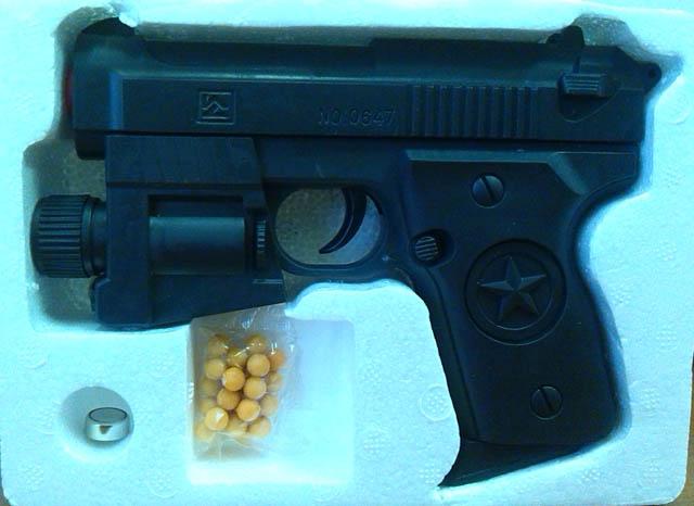 Toy gun with laser