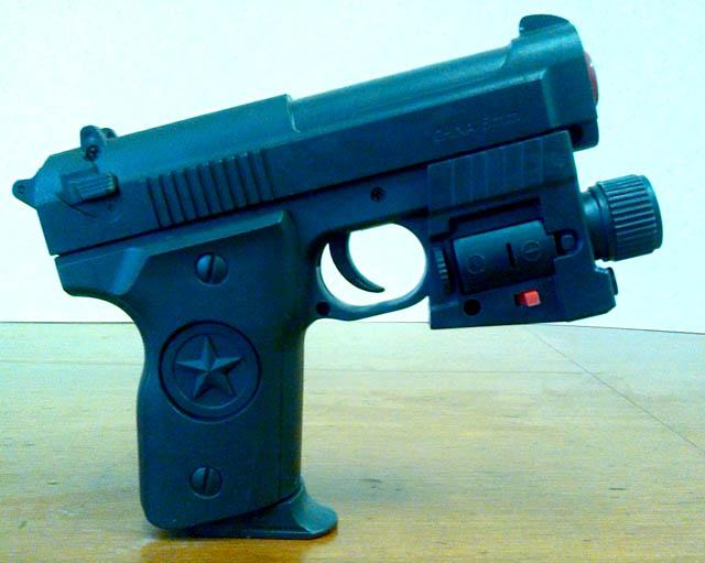 Toy gun with laser