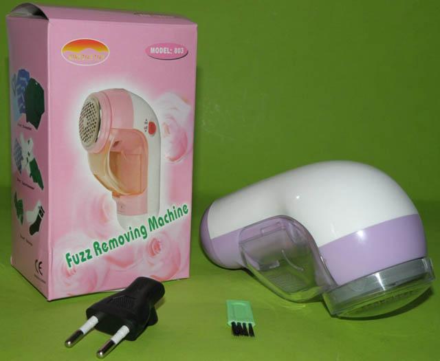 Fuzz removing machine